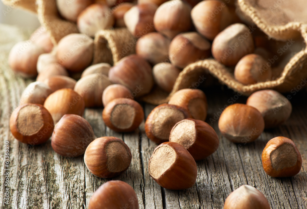 Hazelnuts, filbert on old wooden background Hazelnuts, filbert on old wooden background