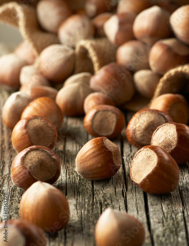 Hazelnuts, filbert on old wooden background