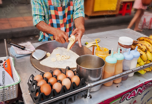 Photography Cooking Thai Banana Pancake on the street