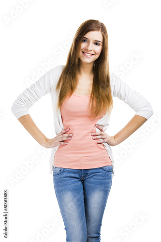 Beautiful blonde woman standing over a white background