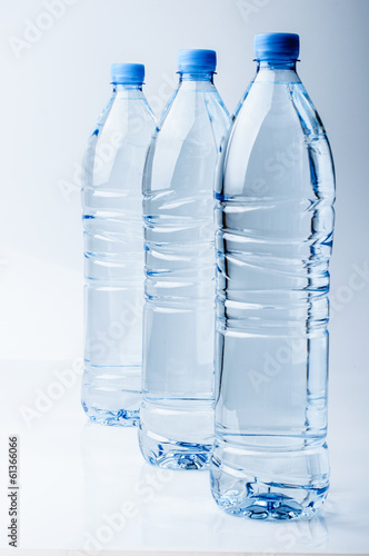 Three bottles of crystal-clear water © Fxquadro