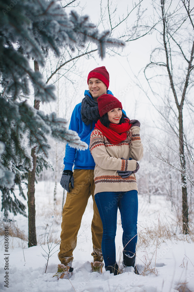 Guy and girl walk and have fun in the forest Guy and girl walk and have fun in the forest