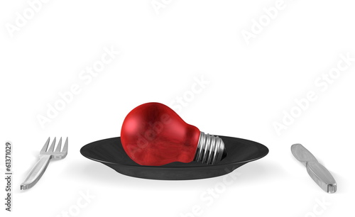 Red light bulb, black plate, steel fork and knife. Front view