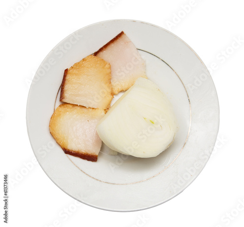 smoked bacon and onions in a plate on white background