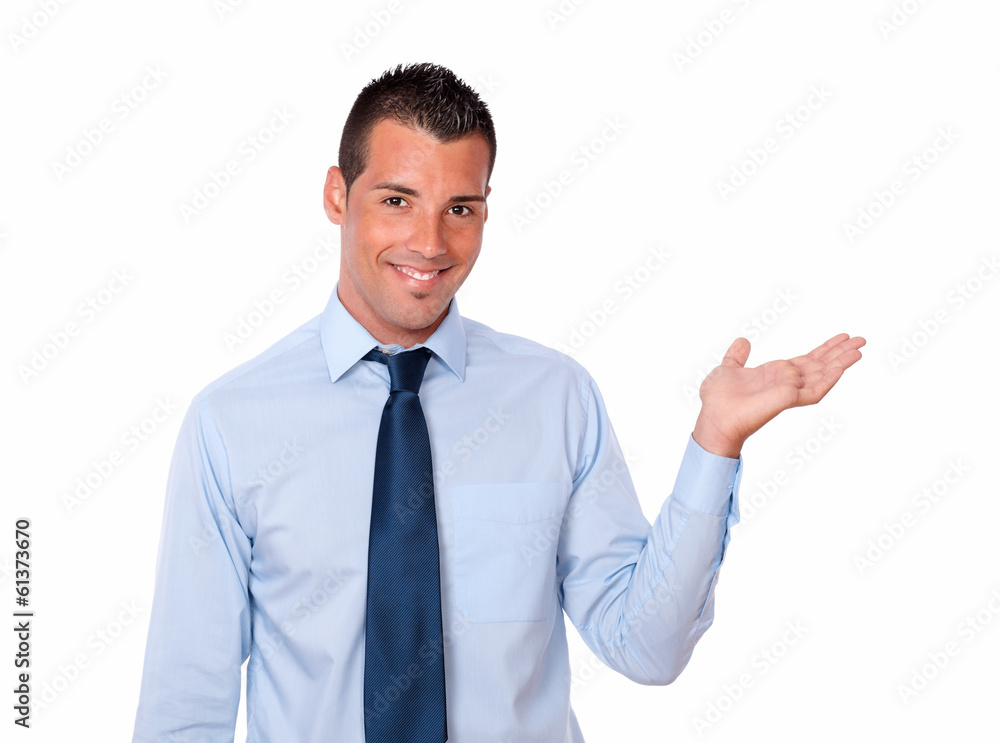 Handsome guy holding out his left palm Handsome guy holding out his left palm