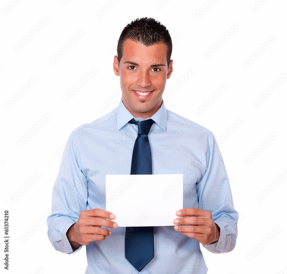 Cute hispanic guy holding a blank card Cute hispanic guy holding a blank card