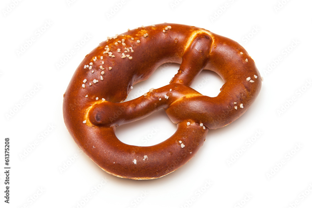 Rock salt pretzel isolated on a white studio background. Rock salt pretzel isolated on a white studio background.