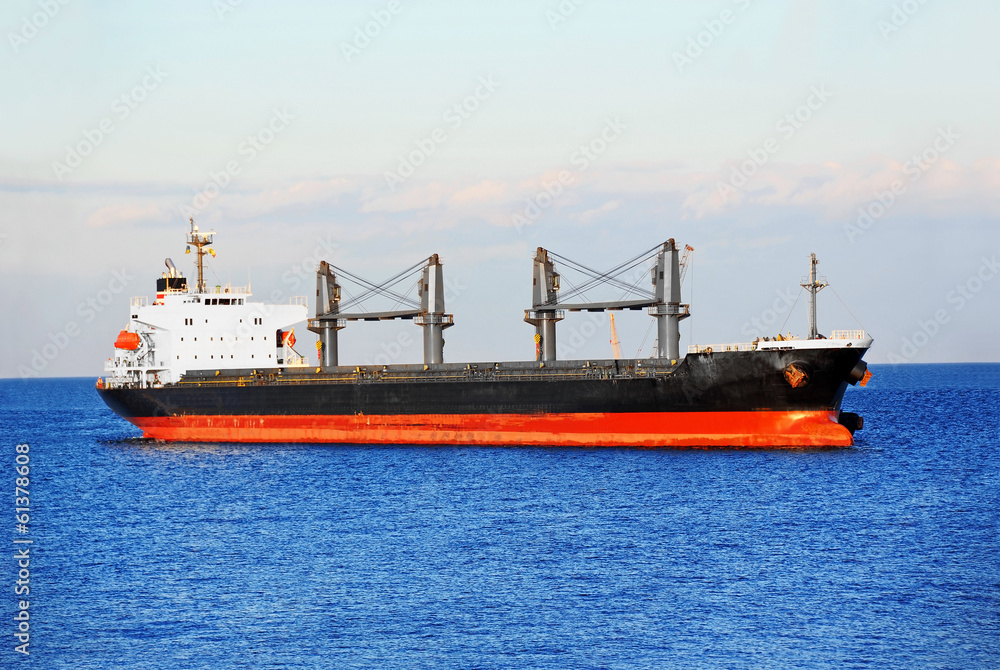 Bulk cargo ship in Odessa harbor quayside Bulk cargo ship in Odessa harbor quayside