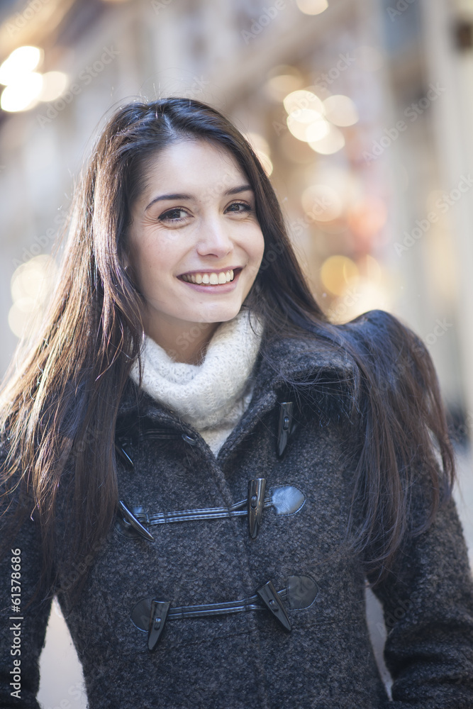 handsome woman portrait with city lights in background handsome woman portrait with city lights in background