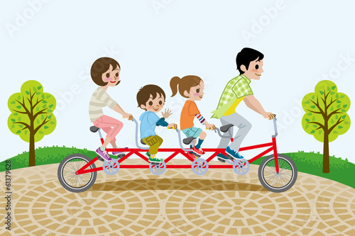 Family riding Tandem Bicycle, in the park