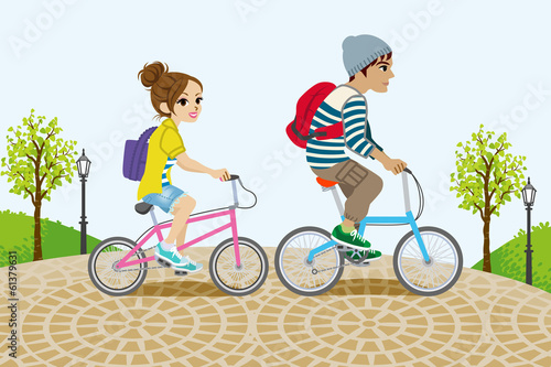 Couple Riding Bicycle in the Park