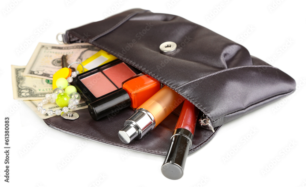 Items contained in the women's handbag isolated on white Items contained in the women's handbag isolated on white