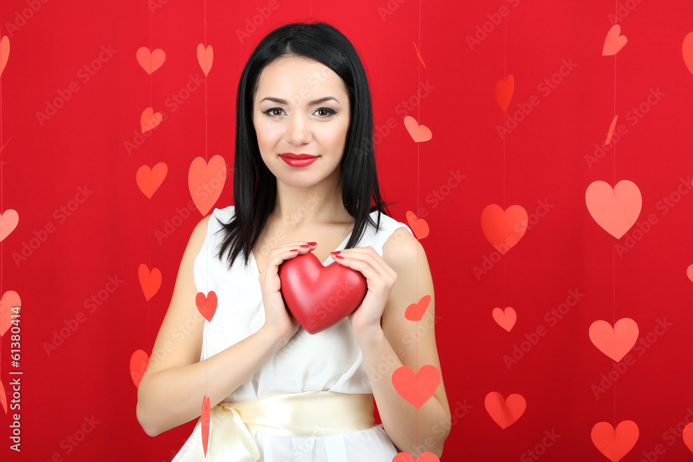 Attractive young woman with heart on Valentine Day Attractive young woman with heart on Valentine Day