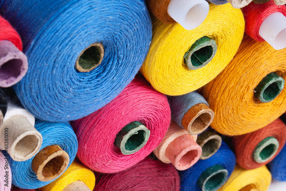 spools of thread of different size, texture and colour spools of thread of different size, texture and colour