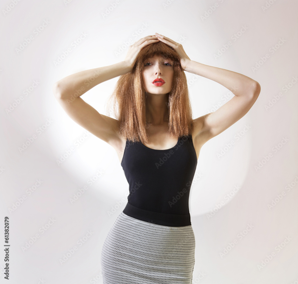 Pretty redhead woman posing. Pretty redhead woman posing.
