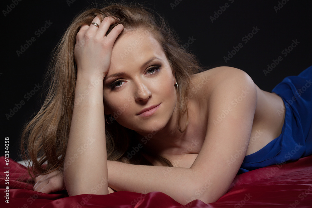Portrait of sensual relaxed girl looking at camera Portrait of sensual relaxed girl looking at camera