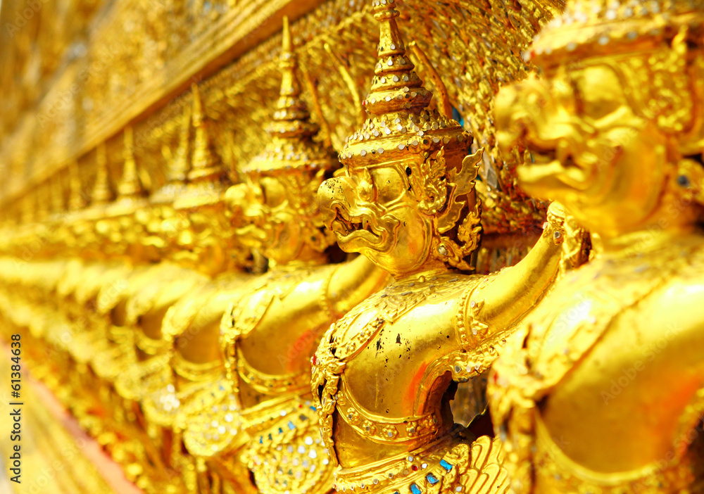 Row of buddha statue in grand palace
