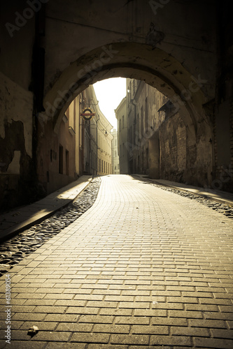 Cobbled old town street   in the down  in the backgriund visible