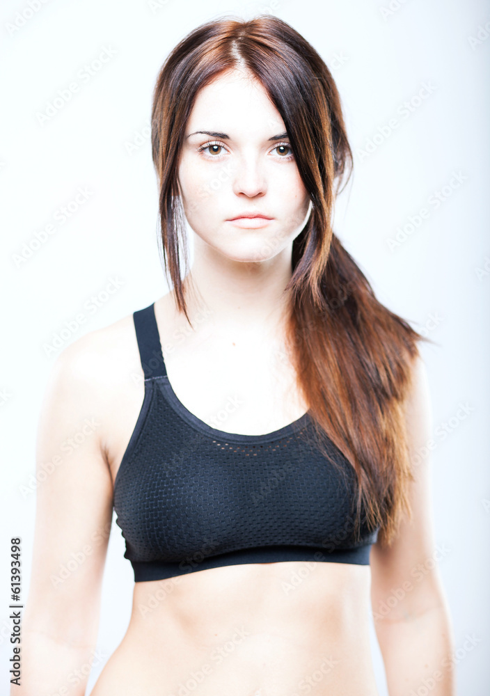 Attractive young athletic woman, sports bra Attractive young athletic woman, sports bra