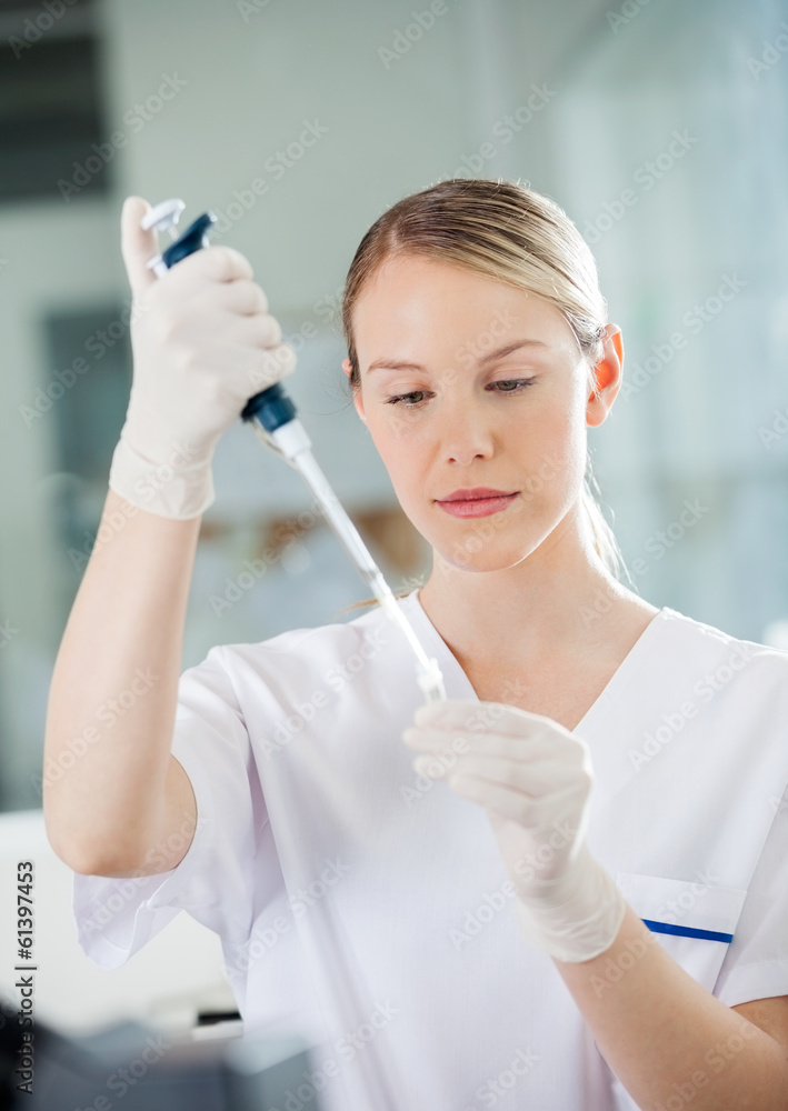 Healthcare Worker Filling Solution Into Test Tube Healthcare Worker Filling Solution Into Test Tube