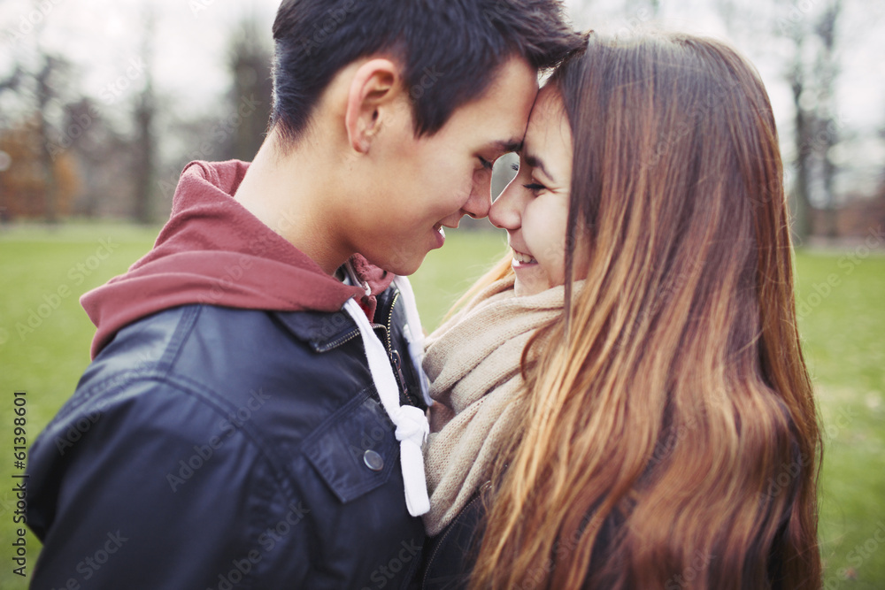 Romantic young couple sharing a special moment Romantic young couple sharing a special moment