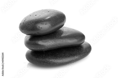 Growing piled up pebbles on a white background