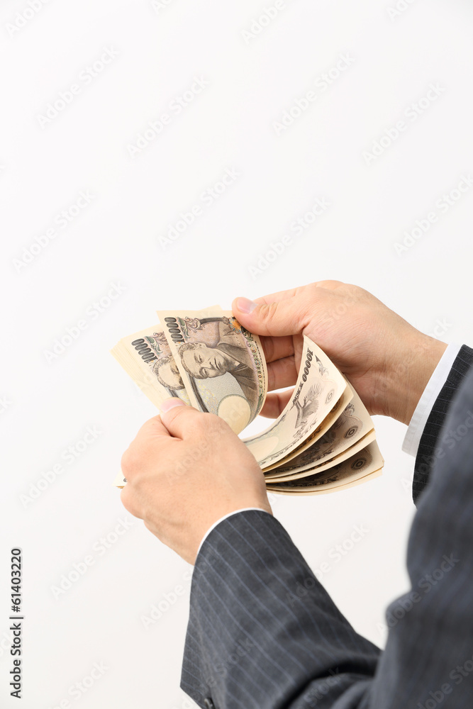 お金を数える男性 Stock Photo Adobe Stock お金を数える男性 Stock Photo Adobe Stock