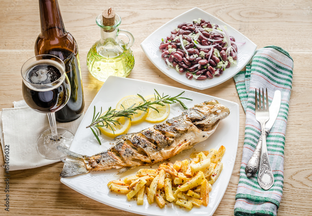 Baked seabass with fried potatoes