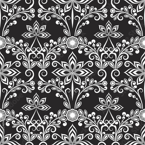 Seamless black and white floral wallpaper pattern.