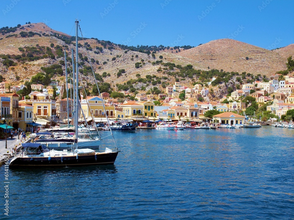 Old harbor with boats at Symi, Greece - obrazy, fototapety, plakaty 