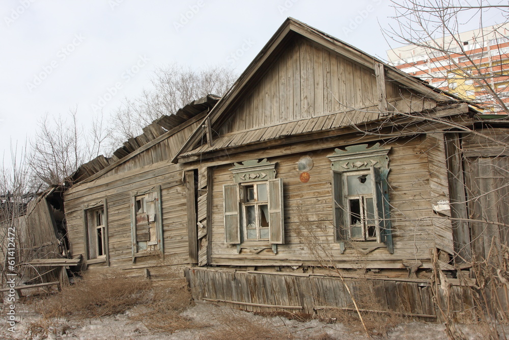 Deserted and a broken old wooden house in the city Deserted and a broken old wooden house in the city