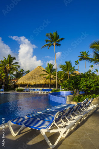 Exotic vacation by the hotel pool. Caribbean Islands, Dominicana