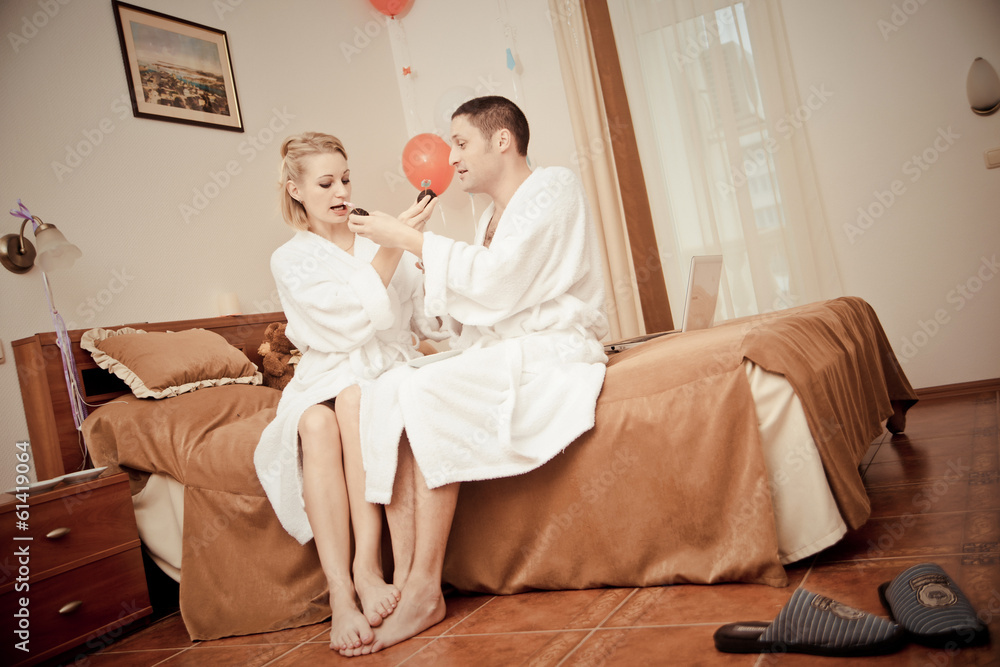Man and woman drinking coffee in the morning in bed. Man and woman drinking coffee in the morning in bed.