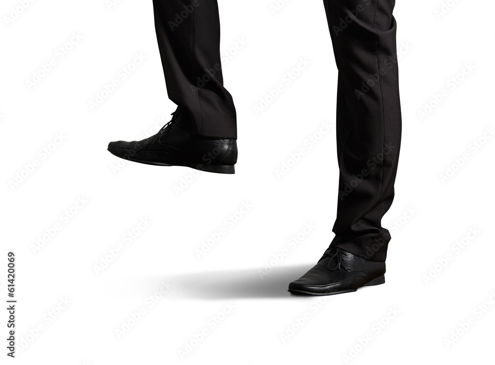 legs in black trousers and shoes legs in black trousers and shoes