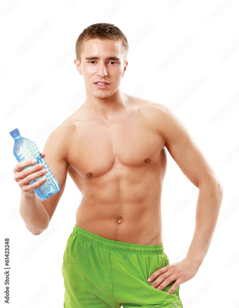 Man drinking water after workout in the gym Man drinking water after workout in the gym