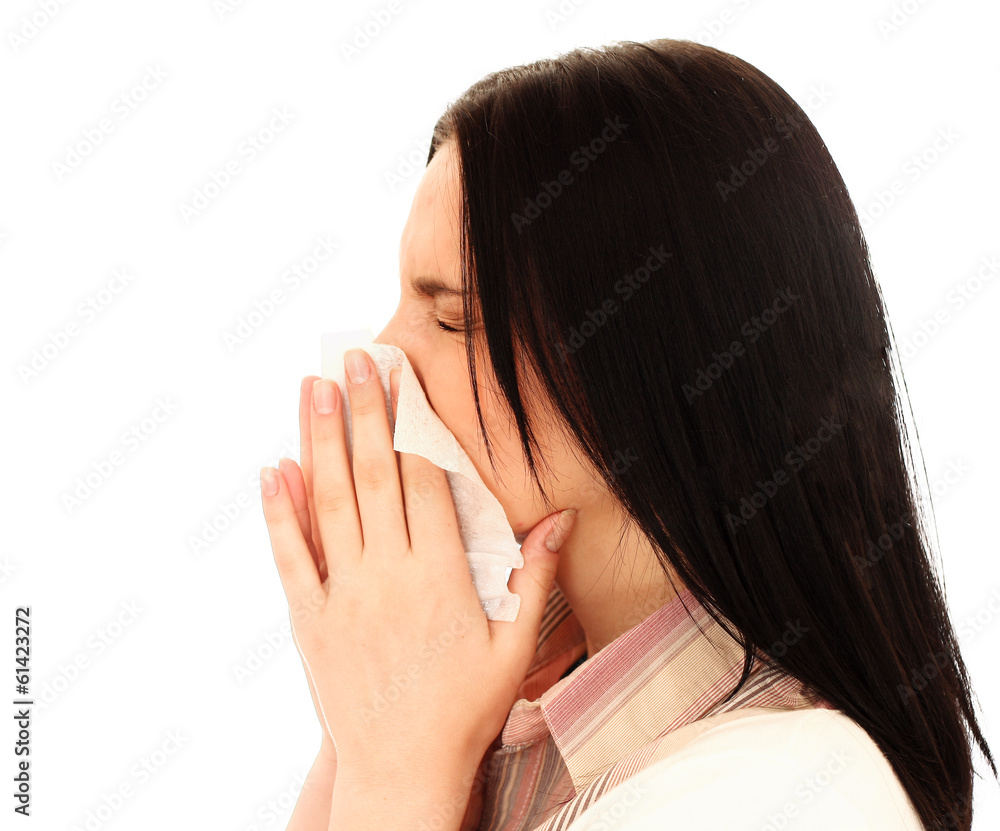 young woman blow nose isolated on white background young woman blow nose isolated on white background