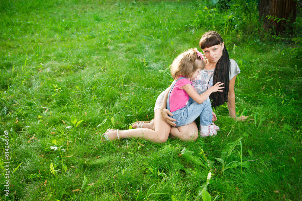 Fototapeta premium Young mother with child