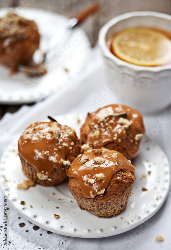 Muffins with caramel frosting and nuts