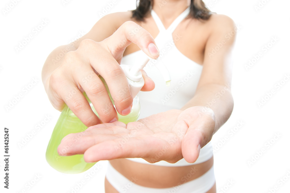 Liquid soap in female hands Liquid soap in female hands