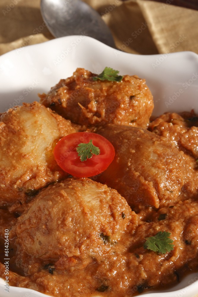Awadhi Dum Aloo is stuffed potato cooked in silky sauce. Awadhi Dum Aloo is stuffed potato cooked in silky sauce.