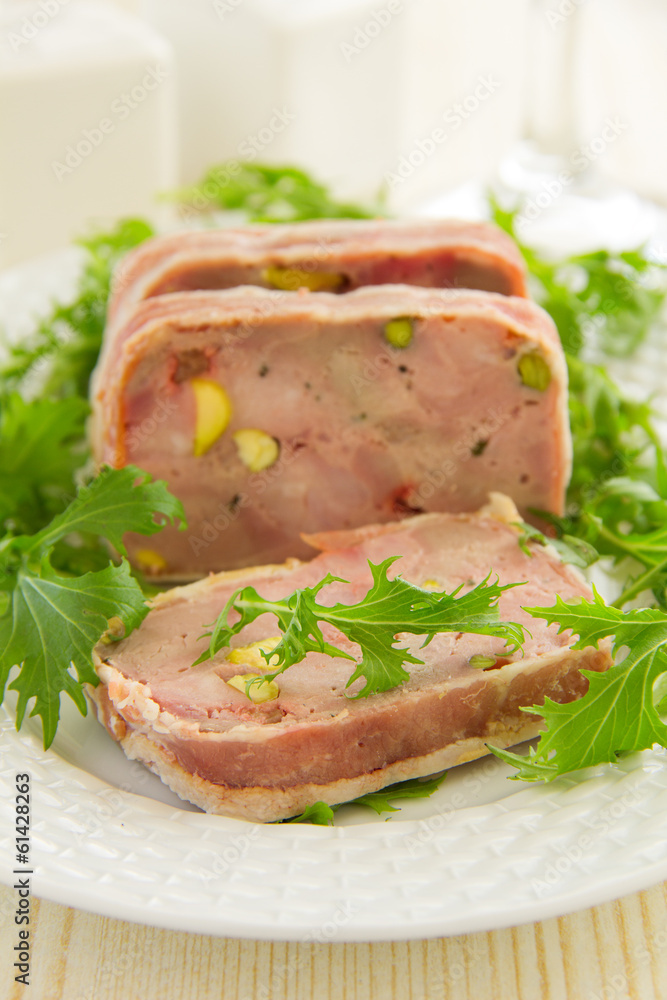 Duck terrine with pistachios and cherries.