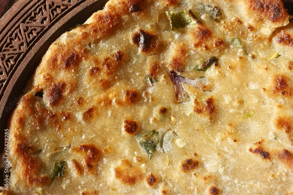 Thick flatbread/Chapati made with onions and coriander Thick flatbread/Chapati made with onions and coriander