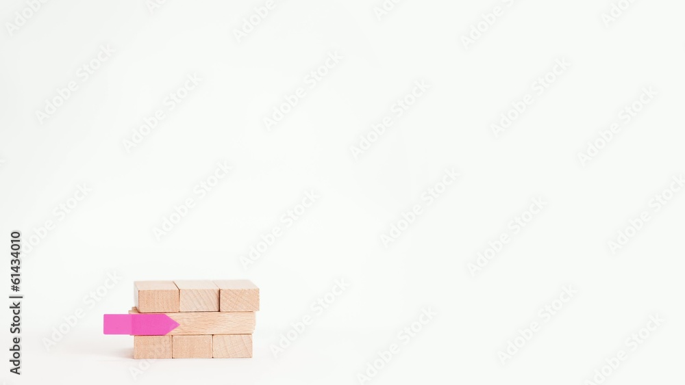 Business building with wood cube and sticker on the left side