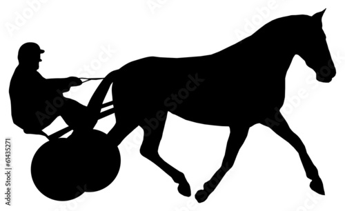 a jockey on his horse during a horse race