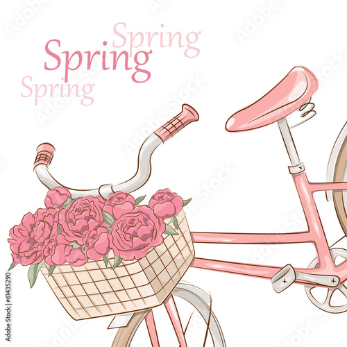 Retro pink bicycle with basket of flowers
