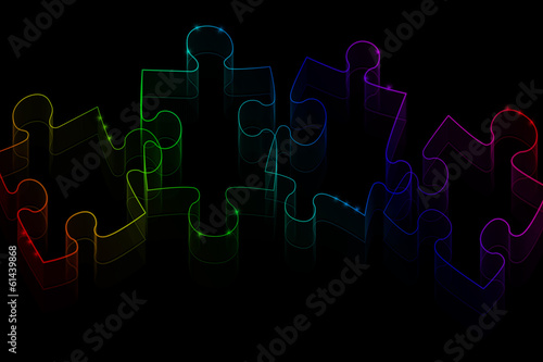 Neon puzzle pieces on a black background