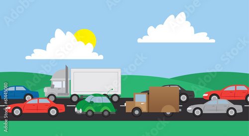 Cars and trucks in traffic on a road