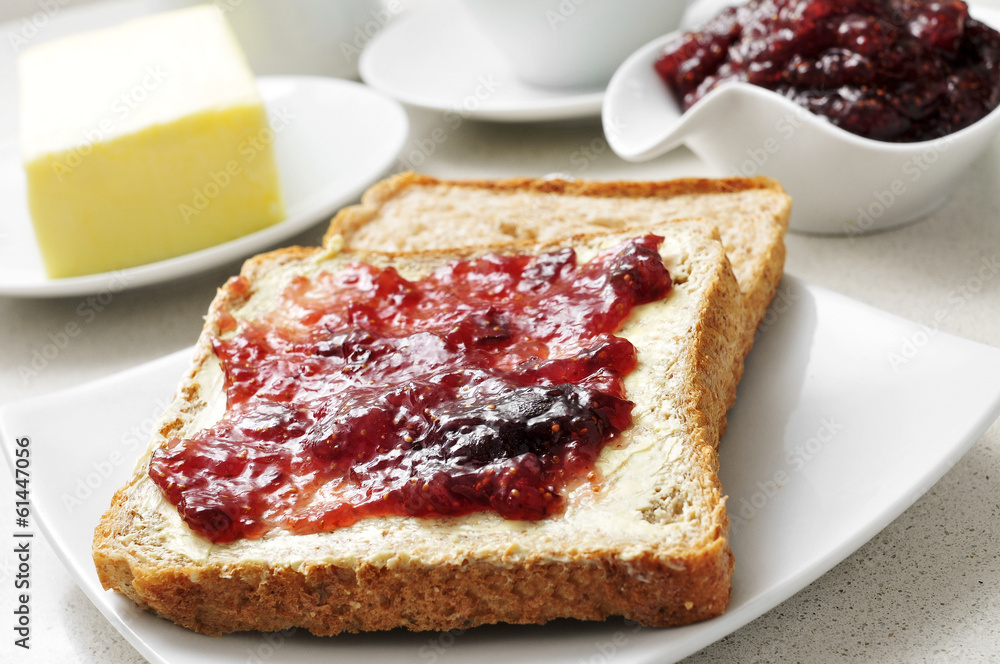 coffee and toasts with butter and jam coffee and toasts with butter and jam