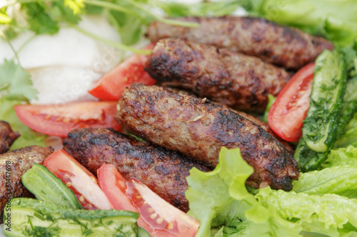 lula kebab from lamb with vegetables photo