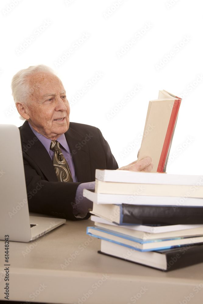Elderly man business computer book read Elderly man business computer book read